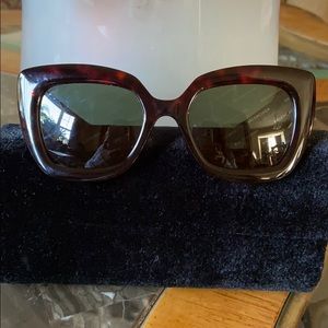Balenciaga sunglasses.
